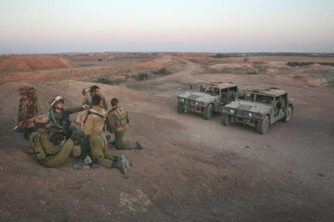 כוחות צה"ל במהלך מבצע "צוק איתן" (צילום: רויטרס)